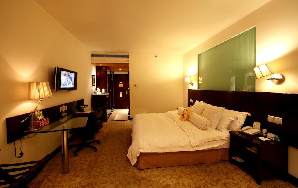 Jinan Gui Du Hotel Quarto foto
